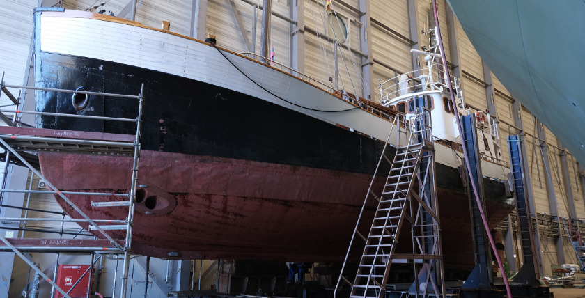 Repairing a fishing boat requires traditional craftsmanship