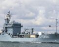 The multi-purpose helicopters Sea King 89+63 and 89+58 fly in formation over the tender A 514 Werra in the Kiel Fjord, photo: Bundeswehr/Alexander Ullmann