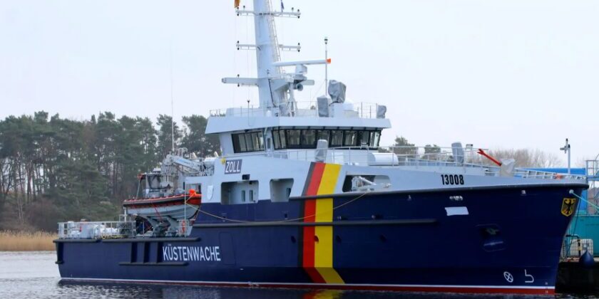 Modern LNG customs vessel of the coast guard in the harbour, with German tricolour on the bow. Copyright NVL - Photo: Tilo Wallrodt
