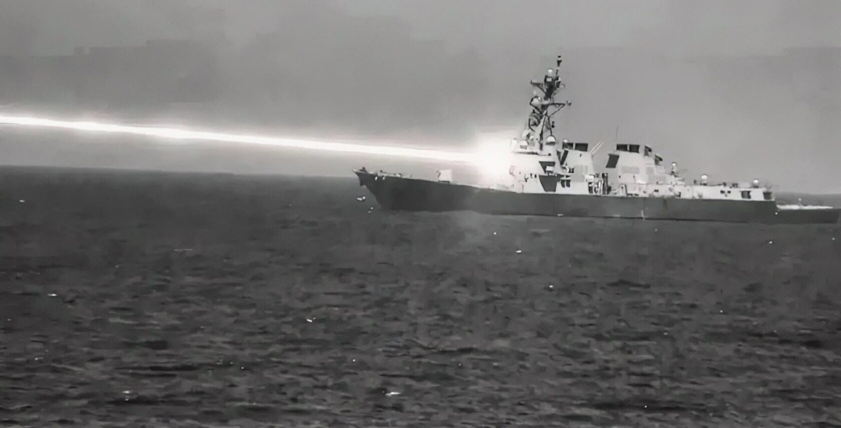 Photo: HELIOS laser test on USS PREBLE. US Navy