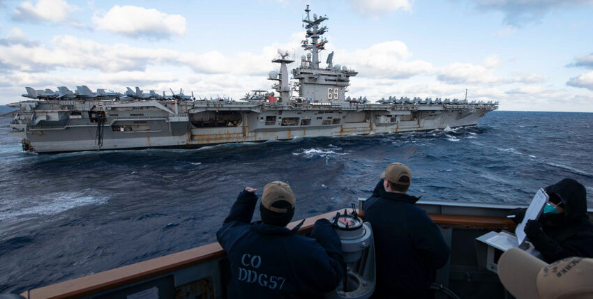 USS Dwight D. Eisenhower in front of a RAS with the destroyer Mitscher in the Atlantic