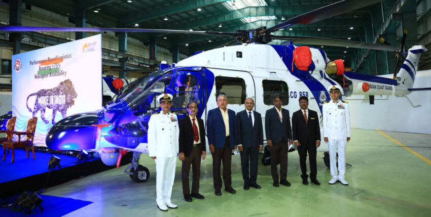 Group picture with helicopter