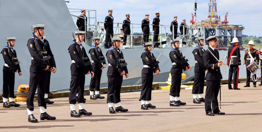 Line-up in front of the HMS Spey