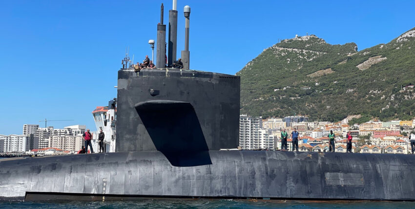 USS Alaska off the Monkey Rock of Gibraltar