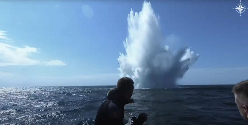 Mine divers observe the detonation of a mine in the Baltic Sea