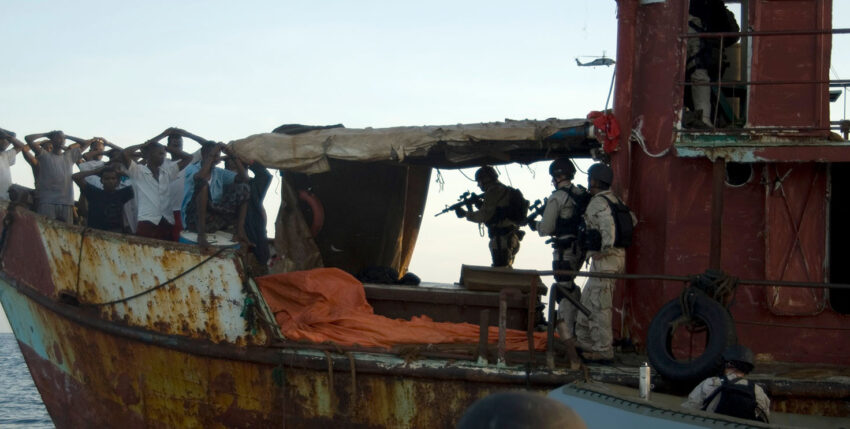 US soldiers search a suspicious boat in the Gulf of Aden
