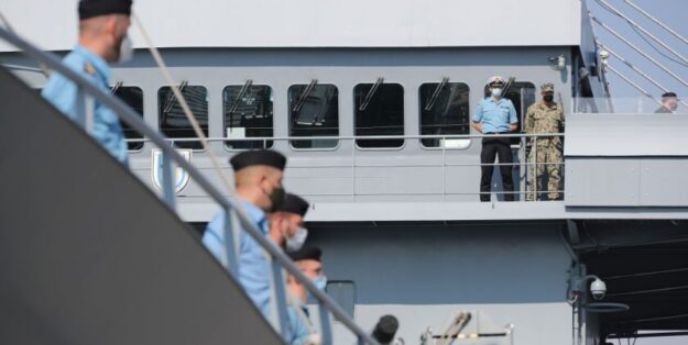 Corvette Captain Sebastian Nacke, commander of the Elbe tender, and Captain Sam Brasfield on the bridge of the tender