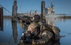 Combat swimmers (KSM) train loading during an exercise in the harbour area at the Eckernförde base, 09.06.2021.