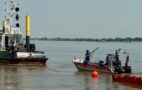 Foto: Ausbringen einer Ölsperre auf der Weser. Bundesanstalt Technisches Hilfswerk